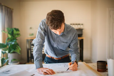 Erik Larsen at the drafting table